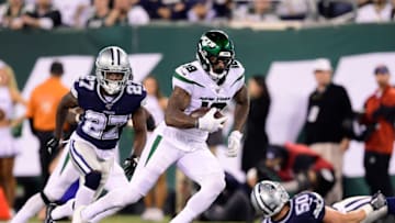 EAST RUTHERFORD, NEW JERSEY - OCTOBER 13: Demaryius Thomas #18 of the New York Jets carries the ball against Jourdan Lewis #27 of the Dallas Cowboys at MetLife Stadium on October 13, 2019 in East Rutherford, New Jersey. (Photo by Steven Ryan/Getty Images)