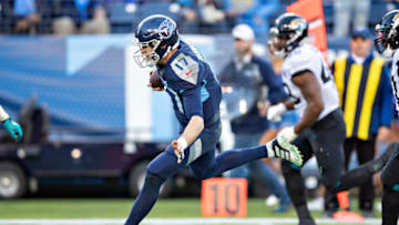 NASHVILLE, TN - NOVEMBER 24: Ryan Tannehill #17 of the Tennessee Titans runs the ball for a touchdown during the first half of a game against the Jacksonville Jaguars at Nissan Stadium on November 24, 2019 in Nashville, Tennessee. The Titans defeated the Jaguars 42-20. (Photo by Wesley Hitt/Getty Images)