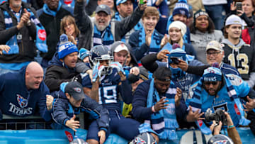 NASHVILLE, TN - DECEMBER 22: Tajae Sharpe #19 of the Tennessee Titans celebrates with fans after scoring a touchdown during a game against New Orleans Saints at Nissan Stadium on December 22, 2019 in Nashville, Tennessee. The Saints defeated the Titans 38-28. (Photo by Wesley Hitt/Getty Images)