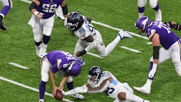 MINNEAPOLIS, MINNESOTA - SEPTEMBER 27: Harold Landry #58 of the Tennessee Titans knocks a loose ball away from quarterback Kirk Cousins #8 of the Minnesota Vikings during the fourth quarter of the game at U.S. Bank Stadium on September 27, 2020 in Minneapolis, Minnesota. The Titans defeated the Vikings 31-30. (Photo by Hannah Foslien/Getty Images)