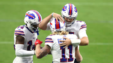 LAS VEGAS, NEVADA - OCTOBER 04: Josh Allen #17 of the Buffalo Bills celebrates with Cole Beasley #11 after throwing an 11 yard touchdown pass against the Las Vegas Raiders during the second quarter in the game at Allegiant Stadium on October 04, 2020 in Las Vegas, Nevada. (Photo by Matthew Stockman/Getty Images)
