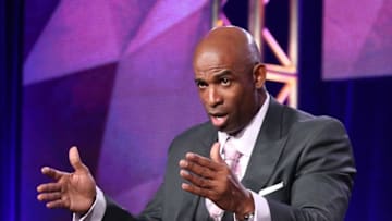 PASADENA, CA - JANUARY 09: Deion Sanders, Talent and Executive Producer, speaks onstage during the 'OWN: Oprah Winfrey Network - Deion's Family Playbook' panel discussion at the Discovery Communications portion of the 2014 Winter Television Critics Association tour at the Langham Hotel on January 9, 2014 in Pasadena, California. (Photo by Frederick M. Brown/Getty Images)