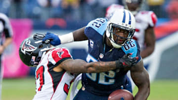 NASHVILLE, TN - OCTOBER 25: Delanie Walker #82 of the Tennessee Titans stiff arms Ricardo Allen #37 of the Atlanta Falcons at Nissan Stadium on October 25, 2015 in Nashville, Tennessee. The Falcons defeated the Titans 10-7. (Photo by Wesley Hitt/Getty Images)