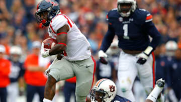 AUBURN, AL - OCTOBER 31: Quincy Adeboyejo #8 of the Mississippi Rebels breaks a tackle by Cassanova McKinzy #8 of the Auburn Tigers at Jordan-Hare Stadium on October 31, 2015 in Auburn, Alabama. (Photo by Kevin C. Cox/Getty Images)