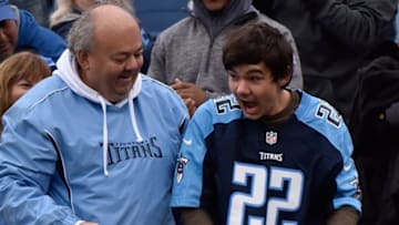 NASHVILLE, TN - JANUARY 01: A young fan reacts after receiving the ball used in a touchdown by DaQuan Jones (not shown) of the Tennessee Titans against the Houston Texans during the first half at Nissan Stadium on January 1, 2017 in Nashville, Tennessee. (Photo by Frederick Breedon/Getty Images)