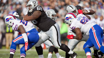 OAKLAND, CA - DECEMBER 4: Guard Gabe Jackson #66 of the Oakland Raiders blocks linebacker Zach Brown #53 of the Buffalo Bills in the first quarter on December 4, 2016 at Oakland-Alameda County Coliseum in Oakland, California. The Raiders won 38-24. (Photo by Brian Bahr/Getty Images)