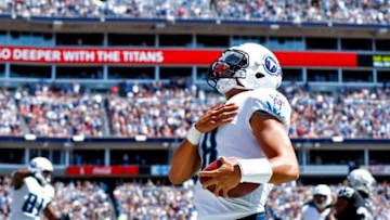 NASHVILLE, TN- SEPTEMBER 10: Quarterback Marcus Mariota #8 of the Tennessee Titans scores a touchdown against the Oakland Raiders in the first half at Nissan Stadium on September 10, 2017 In Nashville, Tennessee. (Photo by Wesley Hitt/Getty Images) )