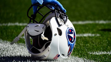 CLEVELAND, OH - OCTOBER 22: A player rests on a Tennessee Titans helmet before the game against the Cleveland Browns at FirstEnergy Stadium on October 22, 2017 in Cleveland, Ohio. (Photo by Jason Miller/Getty Images)