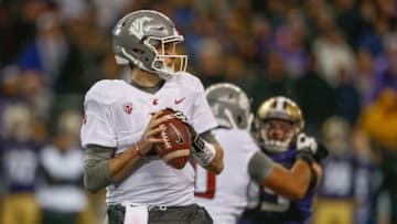 SEATTLE, WA - NOVEMBER 25: Quarterback Luke Falk #4 of the Washington State Cougars looks downfield to pass against the Washington Huskies at Husky Stadium on November 25, 2017 in Seattle, Washington. (Photo by Otto Greule Jr/Getty Images)