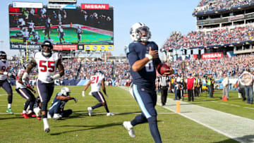 NASHVILLE, TN - DECEMBER 03: Marcus Mariota #8 of the Tennessee Titans celebrates after a touchdown run against the Houston Texans during the first half at Nissan Stadium on December 3, 2017 in Nashville, Tennessee. (Photo by Frederick Breedon/Getty Images)