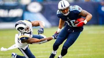 NASHVILLE, TN - DECEMBER 24: Wide Receiver Rishard Matthews #18 of the Tennessee Titans carries the ball against Corner Back Trumaine Johnson #22 of the Los Angeles Rams at Nissan Stadium on December 24, 2017 in Nashville, Tennessee. (Photo by Wesley Hitt/Getty Images)
