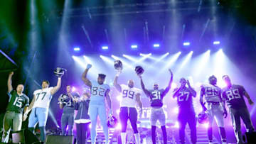 NASHVILLE, TN - APRIL 04: Owner of the Tennessee Titans, Amy Adams Strunk, and a few of the Tennessee Titan players reveal their new jerseys during team up for the "Tradition Evolved" concert event in downtown Nashville to celebrate The Titans new 2018 uniforms on April 4, 2018 in Nashville, Tennessee. (Photo by John Shearer/Getty Images for Florida Georgia Line and Tennessee Titans)