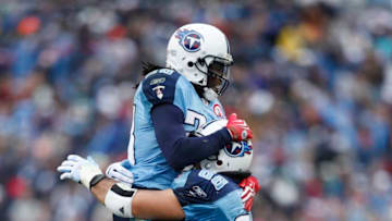 NASHVILLE, TN - DECEMBER 20: Chris Johnson #28 and Kevin Mawae #68 of the Tennessee Titans celebrate after a first half touchdown against the Miami Dolphins at LP Field on December 20, 2009 in Nashville, Tennessee. (Photo by Joe Robbins/Getty Images)