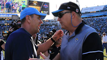 JACKSONVILLE, FL - DECEMBER 24: Interim head coach Doug Marrone of the Jacksonville Jaguars shakes hands with head coach Mike Mularkey of the Tennessee Titans after the game at EverBank Field on December 24, 2016 in Jacksonville, Florida. (Photo by Rob Foldy/Getty Images)