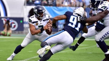 NASHVILLE, TN - SEPTEMBER 24: Derrick Morgan #91 of the Tennessee Titans rushes quarterback Russell Wilson #3 of the Seattle Seahawks during the first half at Nissan Stadium on September 24, 2017 in Nashville, Tennessee. (Photo by Frederick Breedon/Getty Images)