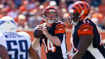 CINCINNATI, OH - SEPTEMBER 21: Andy Dalton #14 of the Cincinnati Bengals throws a pass during the game against the Tennessee Titans at Paul Brown Stadium on September 21, 2014 in Cincinnati, Ohio. (Photo by Andy Lyons/Getty Images)