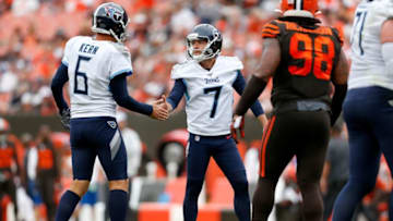 CLEVELAND, OH - SEPTEMBER 8: Cairo Santos #7 of the Tennessee Titans is congratulated by Brett Kern #6 after kicking an extra point during the fourth quarter of the game against the Cleveland Browns at FirstEnergy Stadium on September 8, 2019 in Cleveland, Ohio. Tennessee defeated Cleveland 43-13. (Photo by Kirk Irwin/Getty Images)