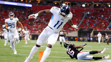 ATLANTA, GA - SEPTEMBER 29: A.J. Brown #11 of the Tennessee Titans rushes in for a touchdown after the reception in the first half of an NFL game against the Atlanta Falcons at Mercedes-Benz Stadium on September 29, 2019 in Atlanta, Georgia. (Photo by Todd Kirkland/Getty Images)