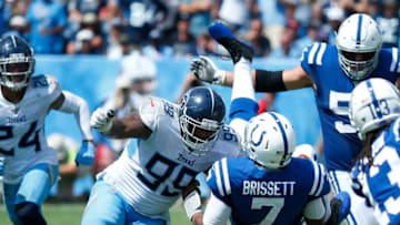 NASHVILLE, TENNESSEE - SEPTEMBER 15: Jacoby Brissett #7 of the Indianapolis Colts is upended by Jurrell Casey #99 of the Tennessee Titans during the first half at Nissan Stadium on September 15, 2019 in Nashville, Tennessee. (Photo by Frederick Breedon/Getty Images)