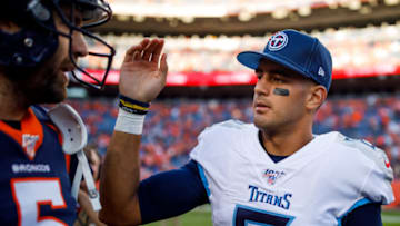 DENVER, CO - OCTOBER 13: Quarterback Joe Flacco #5 of the Denver Broncos talks with quarterback Marcus Mariota #8 of the Tennessee Titans after the game at Empower Field at Mile High on October 13, 2019 in Denver, Colorado. The Broncos defeated the Titans 16-0. (Photo by Justin Edmonds/Getty Images)