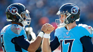 NASHVILLE, TN - OCTOBER 20: Marcus Mariota #8 and Ryan Tannehill #17 of the Tennessee Titans bump fists before a game against the Los Angeles Chargers at Nissan Stadium on October 20, 2019 in Nashville, Tennessee. (Photo by Wesley Hitt/Getty Images)