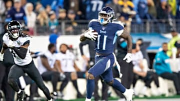 NASHVILLE, TN - NOVEMBER 24: A.J. Brown #11 of the Tennessee Titans runs for a touchdown during the second half of a game against the Jacksonville Jaguars at Nissan Stadium on November 24, 2019 in Nashville, Tennessee. The Titans defeated the Jaguars 42-20. (Photo by Wesley Hitt/Getty Images)