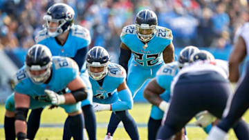 NASHVILLE, TN - DECEMBER 15: Derrick Henry #22 of the Tennessee Titans in the backfield during a game against the Houston Texans at Nissan Stadium on December 15, 2019 in Nashville, Tennessee. The Texans defeated the Titans 24-21. (Photo by Wesley Hitt/Getty Images)