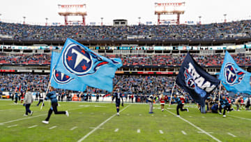 NASHVILLE, TN - DECEMBER 22: Flags are run onto the field of the Tennessee Titans before a game against the New Orleans Saints at Nissan Stadium on December 22, 2019 in Nashville, Tennessee. The Saints defeated the Titans 38-28. (Photo by Wesley Hitt/Getty Images)