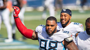 NASHVILLE, TN - SEPTEMBER 20: Jeffery Simmons #98 of the Tennessee Titans signals to the other teams after a game against the Jacksonville Jaguars at Nissan Stadium on September 20, 2020 in Nashville, Tennessee. The Titans defeated the Jaguars 33-30. (Photo by Wesley Hitt/Getty Images)