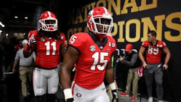 ATLANTA, GA - JANUARY 08: D'Andre Walker #15 and Keyon Brown #11 of the Georgia Bulldogs run out on the field during warm ups before the game against the Alabama Crimson Tide in the CFP National Championship presented by AT&T at Mercedes-Benz Stadium on January 8, 2018 in Atlanta, Georgia. (Photo by Christian Petersen/Getty Images)
