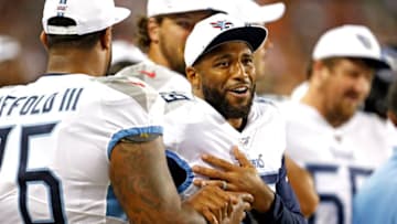 CHICAGO, ILLINOIS - AUGUST 29: Wesley Woodyard #59 of the Tennessee Titans laughs with Rodger Saffold #76 during the second half of a preseason game at Soldier Field on August 29, 2019 in Chicago, Illinois. (Photo by Nuccio DiNuzzo/Getty Images)