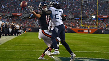 Aug 29, 2019; Chicago, IL, USA; Chicago Bears wide receiver Thomas Ives (14) attempts to make a catch against Tennessee Titans cornerback Tye Smith (23) during the first half at Soldier Field. Mandatory Credit: Mike DiNovo-USA TODAY Sports