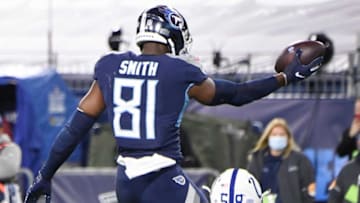 Tennessee Titans tight end Jonnu Smith (81) leaps over Indianapolis Colts linebacker Bobby Okereke (58) for a touchdown during the second quarter at Nissan Stadium Thursday, Nov. 12, 2020 in Nashville, Tenn.Gw51203