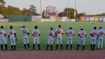 Mississippi Braves bullpen members aligned for the anthem. Aug 2015 vs. Mobile. Photo credit: Alan Carpenter, TomahawkTake.com