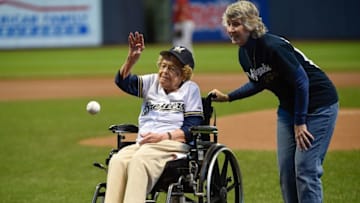 May 31, 2015; Milwaukee, WI, USA; 102-year-old Gladys Holbrook (L) throws the ceremonial first pitch prior to the game between the Milwaukee Brewers and Arizona Diamondbacks at Miller Park. Mandatory Credit: Benny Sieu-USA TODAY Sports