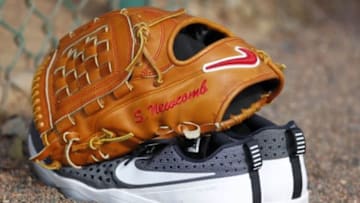 Feb 29, 2016; Lake Buena Vista, FL, USA; Atlanta Braves pitcher Sean Newcomb (not picture) shoes and glove rest on the ground during spring training workouts at ESPN