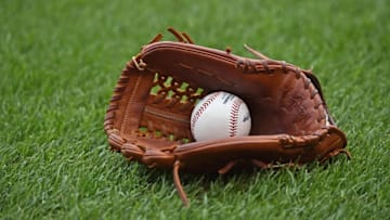 Oct 9, 2015; Kansas City, MO, USA; A general view of a ball and glove on the field before the Kansas City Royals and the Houston Astros play in game two of the ALDS at Kauffman Stadium. Mandatory Credit: Peter G. Aiken-USA TODAY Sports