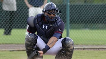 Feb 23, 2015; Lake Buena Vista, FL, USA; Atlanta Braves catcher Christian C. Betancourt digs a ball out of the dirt during spring training workouts at Champion Stadium. Mandatory Credit: Reinhold Matay-USA TODAY Sports