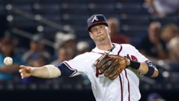 May 26, 2016; Atlanta, GA, USA; Atlanta Braves third baseman Reid Brignac (4) throws a runner out at first against the Milwaukee Brewers in the ninth inning at Turner Field. The Brewers defeated the Braves 6-2. Mandatory Credit: Brett Davis-USA TODAY Sports