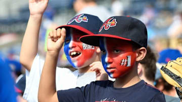 Jun 12, 2016; Atlanta, GA, USA; Atlanta Braves tomahawk squad on top of the dugout during the game against the Chicago Cubs during the seventh inning at Turner Field. Mandatory Credit: Dale Zanine-USA TODAY Sports