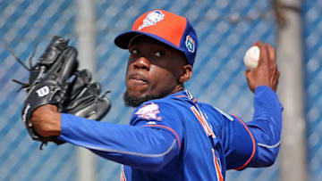 Feb 22, 2016; Port St. Lucie, FL, USA; New York Mets relief pitcher Akeel Morris (64) throws during spring training work out drills at Tradition Field. Mandatory Credit: Steve Mitchell-USA TODAY Sports