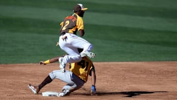 Jul 10, 2016; San Diego, CA, USA; World runner Jorge Bonifacio (bottom) is forced out by USA infielder Travis Demeritte during the All Star Game futures baseball game at PetCo Park. Mandatory Credit: Jake Roth-USA TODAY Sports