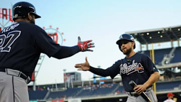 Sep 6, 2016; Washington, DC, USA; Atlanta Braves center fielder Ender Inciarte (11) is congratulated by left fielder Matt Kemp (27) after scoring a run during the first inning against the Washington Nationals at Nationals Park. Mandatory Credit: Brad Mills-USA TODAY Sports