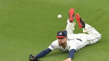 Sep 18, 2016; Braves center fielder Ender Inciarte (11) cannot make a diving catch on a ball hit by Washington Nationals right fielder Bryce Harper (34). Mandatory Credit: Dale Zanine-USA TODAY Sports