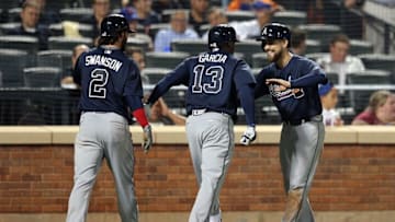 Sep 20, 2016; New York City, NY, USA; Atlanta Braves third baseman Adonis Garcia (13) celebrates his three run home run against the New York Mets with Atlanta Braves shortstop Dansby Swanson (2) and Atlanta Braves center fielder Ender Inciarte (11) during the seventh inning at Citi Field. Mandatory Credit: Brad Penner-USA TODAY Sports