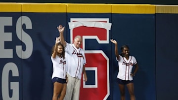 Sep 27, 2016; Atlanta, GA, USA; Atlanta Braves former manager Bobby Cox turns the number of games remaining at Turner Field from 6 to 5 in the fifth inning of the Atlanta Braves game against the Philadelphia Phillies at Turner Field. Mandatory Credit: Jason Getz-USA TODAY Sports