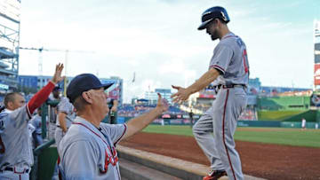 Aug 12, 2016; Washington, DC, USA; Atlanta Braves center fielder Ender Inciarte (11) is congratulated by Atlanta Braves interim manager Brian Snitker (43) after scoring a run against the Washington Nationals during the first inning at Nationals Park. Mandatory Credit: Brad Mills-USA TODAY Sports