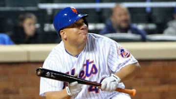 May 2, 2016; New York City, NY, USA; New York Mets starting pitcher Bartolo Colon (40) bunt pops out to the pitcher during the sixth inning against the Atlanta Braves at Citi Field. Mandatory Credit: Anthony Gruppuso-USA TODAY Sports