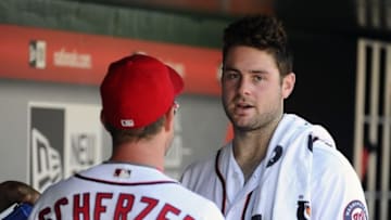 Aug 28, 2016; Washington, DC, USA; Washington Nationals starting pitcher Lucas Giolito (44) talks to starting pitcher Max Scherzer (31) during the fourth inning against the Colorado Rockies at Nationals Park. Mandatory Credit: Brad Mills-USA TODAY Sports