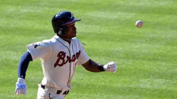 May 28, 2016; Atlanta, GA, USA; Atlanta Braves center fielder Mallex Smith (17) tries to beat out a bunt attempt against the Miami Marlins at Turner Field. The Braves defeated the Marlins 7-2. Mandatory Credit: Dale Zanine-USA TODAY Sports